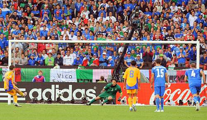 Euro 2008 (17).jpg - Romanian forward Adrian Mutu (L) shoots to miss a penalty in front of Italian goalkeeper Gianluigi Buffon (C), Romanian mildfielder Paul Codrea (3rdR), Italian forward Fabio Quagliarella and defender Giorgio Chiellini during the Euro 2008 Championships Group C football match Italy vs. Romania on June 13, 2008 Italy vs. Romania at Letzigrund stadium in Zurich, Switzerland. The match ended in a 1-1 draw.